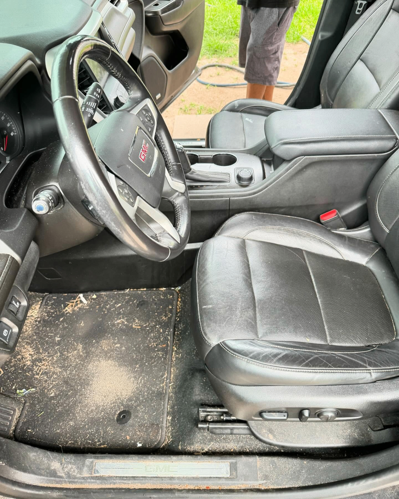 Truck interior before Alaniz Detailing service